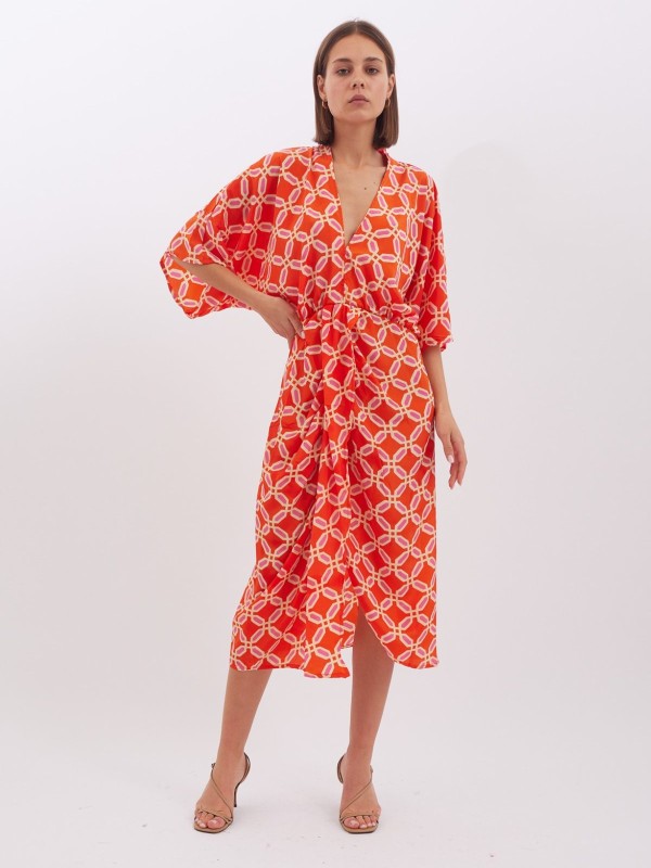 Denise- twist wrap midi dress with front split in orange diamond