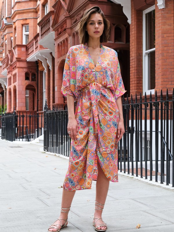 Denise- twist wrap midi dress with front split in orange daisy