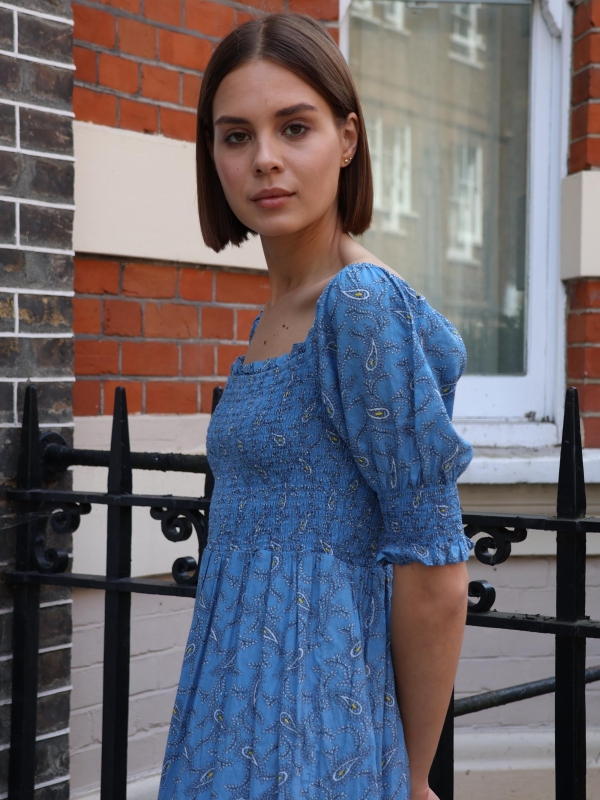 Estelle - shirred floral-print midi dress in blue