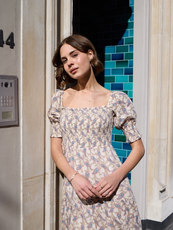 Estelle - shirred floral-print midi dress in beige